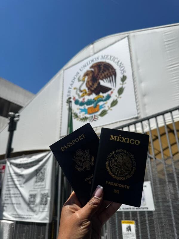 Happy DNExpress family holding Mexican passports